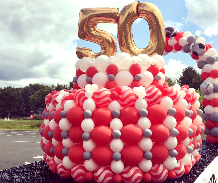 Giant Balloon Cake 50th Anniversary on Parade float